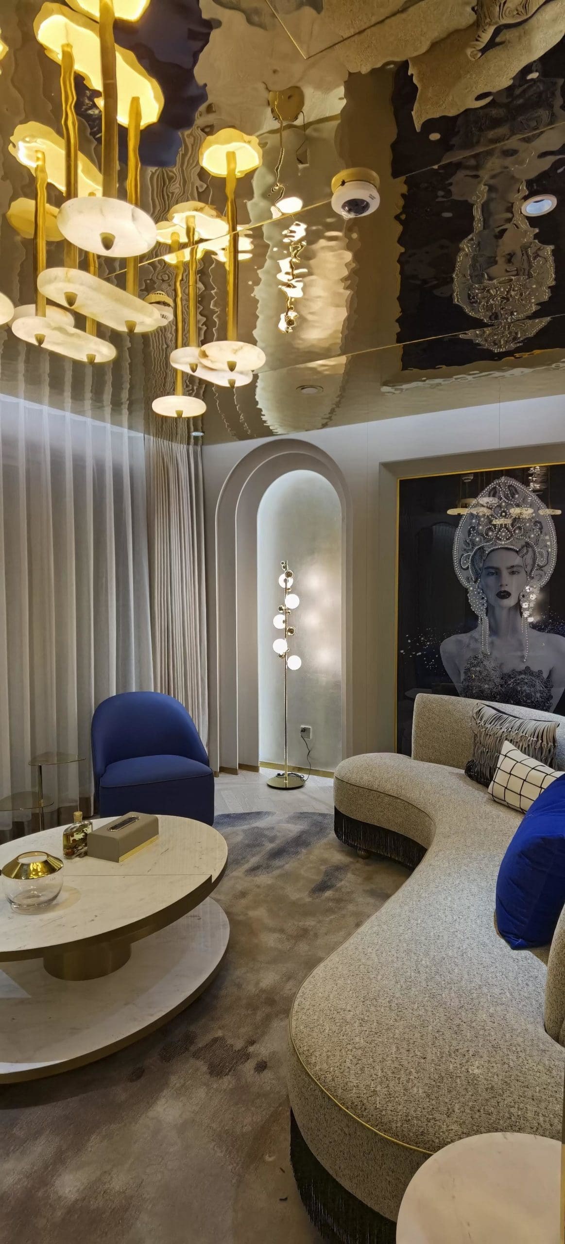 Reflective ceiling panels in a modern interior